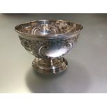 An Edwardian silver sweetmeat bowl, Fenton Brothers, Sheffield 1906, chased with Rococo scrolls