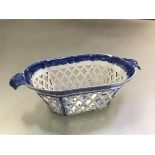 An early 19th century Staffordshire pearlware chestnut basket, of shaped rectangular form, with
