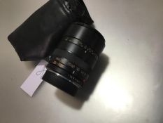 A Leica 35-70mm Vario Elmar-R F4 Macro lens, in a soft carry case