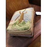 A small tapestry upholstered footstool (30cm x 24cm x 11cm)