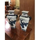 A pair of Decorator 20thc Chinese blue and white square tapered vases, with twin handles to side (2)
