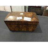 A 19thc walnut sarcophagus shaped tea caddy with twin compartments (missing one lid)