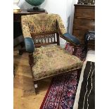 A late 19th century walnut armchair c.1880, the upholstered back and arms above a pierced back and