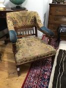 A late 19th century walnut armchair c.1880, the upholstered back and arms above a pierced back and