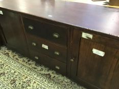 A 19th century oak cabinet from the science laboratory of George Heriots School, Edinburgh, the