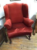A George III style mahogany framed wing chair, late 19th century, with loose-cushioned seat,