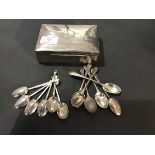 A silver cigarette box together with two sets of six hallmarked silver coffee spoons (a lot)