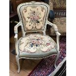 A pair of mid-20th century French salon chairs in the rococo taste, with painted frames and gros-