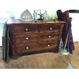 A 19th century mahogany chest of two short and two long drawers, with later glass handles,