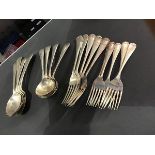 A group of Old English pattern hallmarked silver flatware, engraved tops, including five table