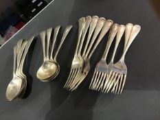 A group of Old English pattern hallmarked silver flatware, engraved tops, including five table