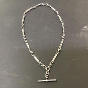 A white metal fancy link necklace in the form of a watch chain, with T bar to base, marked 925 (