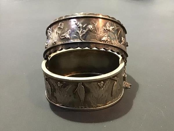 Two Victorian white metal hinged bangles (2)