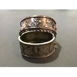 Two Victorian white metal hinged bangles (2)