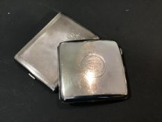 Two Birmingham silver cigarette cases, one with all over engine turned decoration and other with