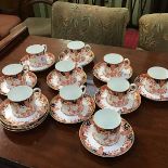A Royal Crown Derby Imari pattern 22 piece coffee set consisting of ten coffee cans and twelve