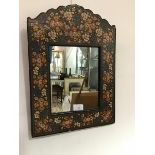 A Kashmiri style wall mirror, the shaped top with painted floral decoration, enclosing a plain