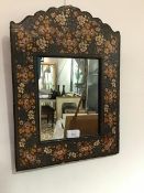 A Kashmiri style wall mirror, the shaped top with painted floral decoration, enclosing a plain