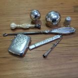 A mixed lot of silver including a 19thc ivory handled white metal seal in the form of clenched