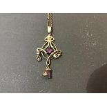 A 9ct gold amethyst set lady's pendant on a yellow metal chain marked 925 (3.4g)