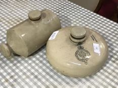 An unusual stoneware circular hot water bottle by Reader of Stalbridge, together with another (2)