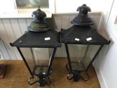 Two Edinburgh glazed copper street lanterns on four armed mounting brackets, glass replaced by