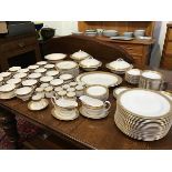 A Royal Grafton Regal pattern white bone china dinner service with gilt edged decoration, consisting