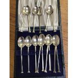 A set of ten and a set of six seal terminal silver coffee spoons, different dates (5oz)