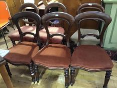 A collection of six Victorian balloon-back dining chairs, including a set of three chairs; a pair of