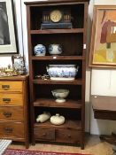 A modern hardwood open bookcase, the five open shelves above a pair of drawers (201 x 82 x 41cm)