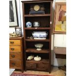 A modern hardwood open bookcase, the five open shelves above a pair of drawers (201 x 82 x 41cm)