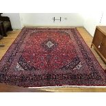 An Iranian Kashan fine hand knotted wool carpet, the central medallion with lotus flower and and