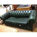 A modern leather Chesterfield sofa bed, with button upholstery (69 x 185 x 88cm)