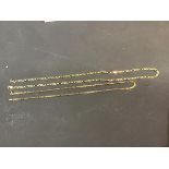 A 9ct gold chain together with a yellow metal chain, marked 9ct (2) (10g)