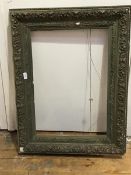 An ornate moulded picture frame (internal: 47cm x 67cm)