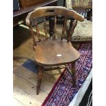 An early 20th century country-style chair, with hoop back, laminated seat and turned legs (75cm