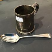 An engraved Birmingham silver tankard with C scroll handle, together with a silver serving spoon (2)