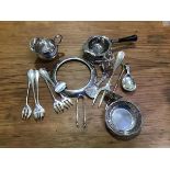 A mixed lot of silver, white metal and silver plate including a tea strainer, cream jug, ashtrays,