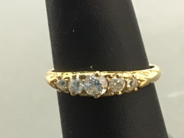 A five stone diamond ring on 18ct gold shank (O) (2.65g)