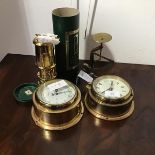 A mixed lot comprising a modern quartz ships bulkhead style wall clock and barometer, together