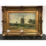 20thc School, Windmill at Harvest, oil on canvas, indistinctly signed lower right, in moulded gilded