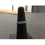 A four stone diamond engagement ring on 18ct gold shank (M/L) (2.13g)