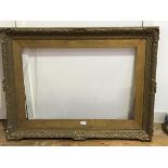 A moulded gilt frame (internal: 77cm x 51cm)