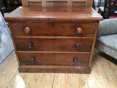 A small Victorian mahogany chest of three long drawers, raised on a plinth base (81 x 104 x 56cm)