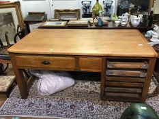 A Scottish early 20th century pine baker's cabinet by Scottie & McIntosh, Edinburgh and Glasgow,