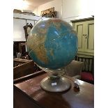 A Mid Century illuminating terestrial Atlas globe on perspex and metal stand (h.59cm x 43cm)