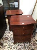 A pair of modern hardwood bedside cabinets by Willis & Gambier, each with three cedar lined