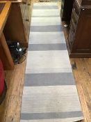 An Indian wool runner, horizontal grey stripes (295cm x 65cm)