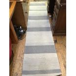 An Indian wool runner, horizontal grey stripes (295cm x 65cm)