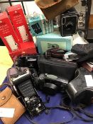 Camera equipment: a mixed lot of cameras including a Kodak, a Brownie, a Pentax Zoom 105, a